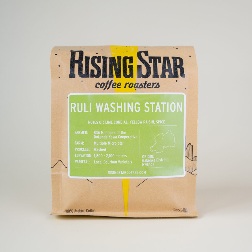 A bag of Rising Star Coffee Roaster's Coffee named Ruli Washing Station. The label is lime green with a map of Rwanda.