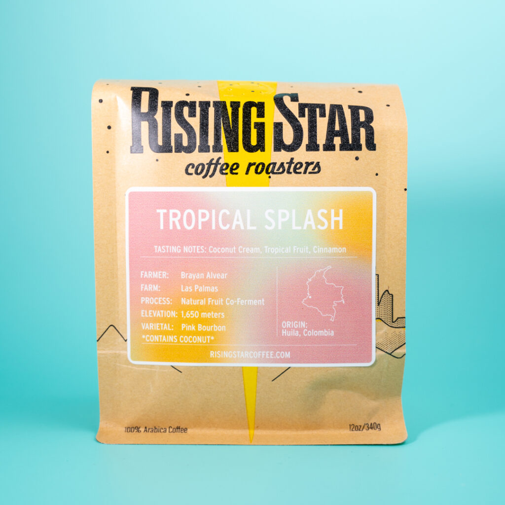 A bag of Rising Star Coffee's Tropical Splash. It is a co-fermented coffee with coconut. ALLERGEN WARNING: THIS PRODUCT CONTAINS COCONUT