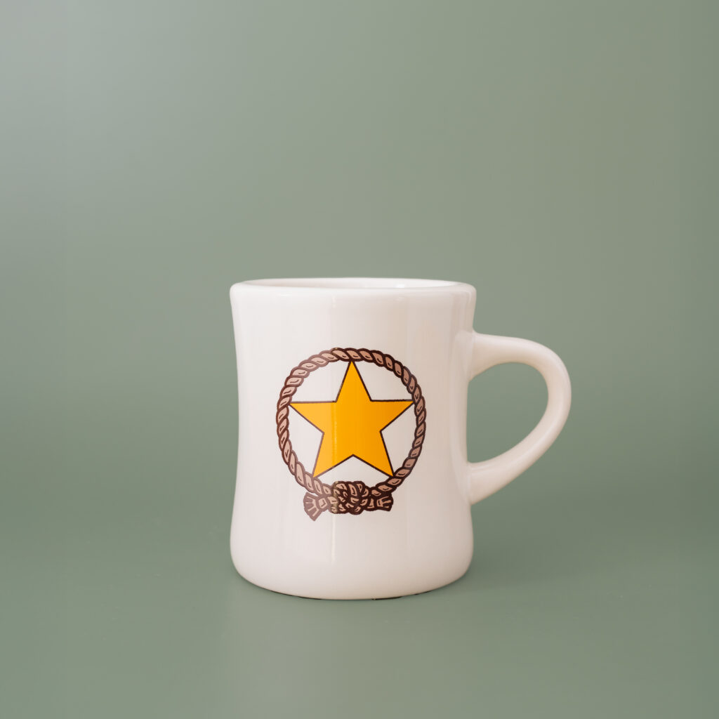 A ceramic diner mug with a lasso design