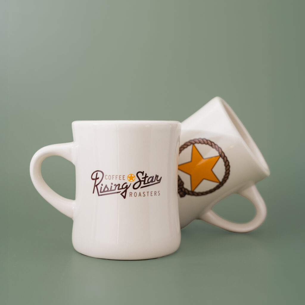 A ceramic diner mug with a lasso and script Rising Star