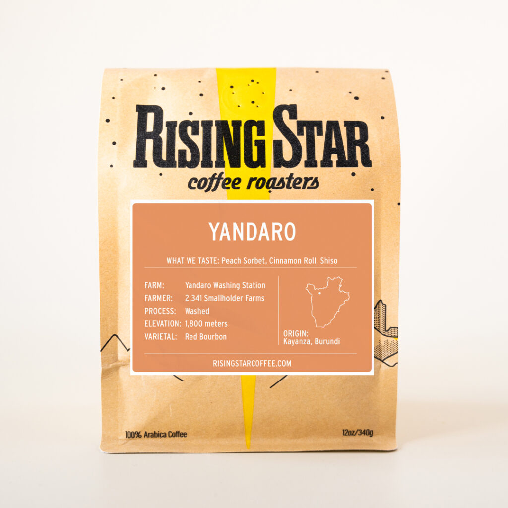 A bag of Rising Star Coffee with a light orange label that reads Yandaro - a coffee from Kayanza, Burundi.