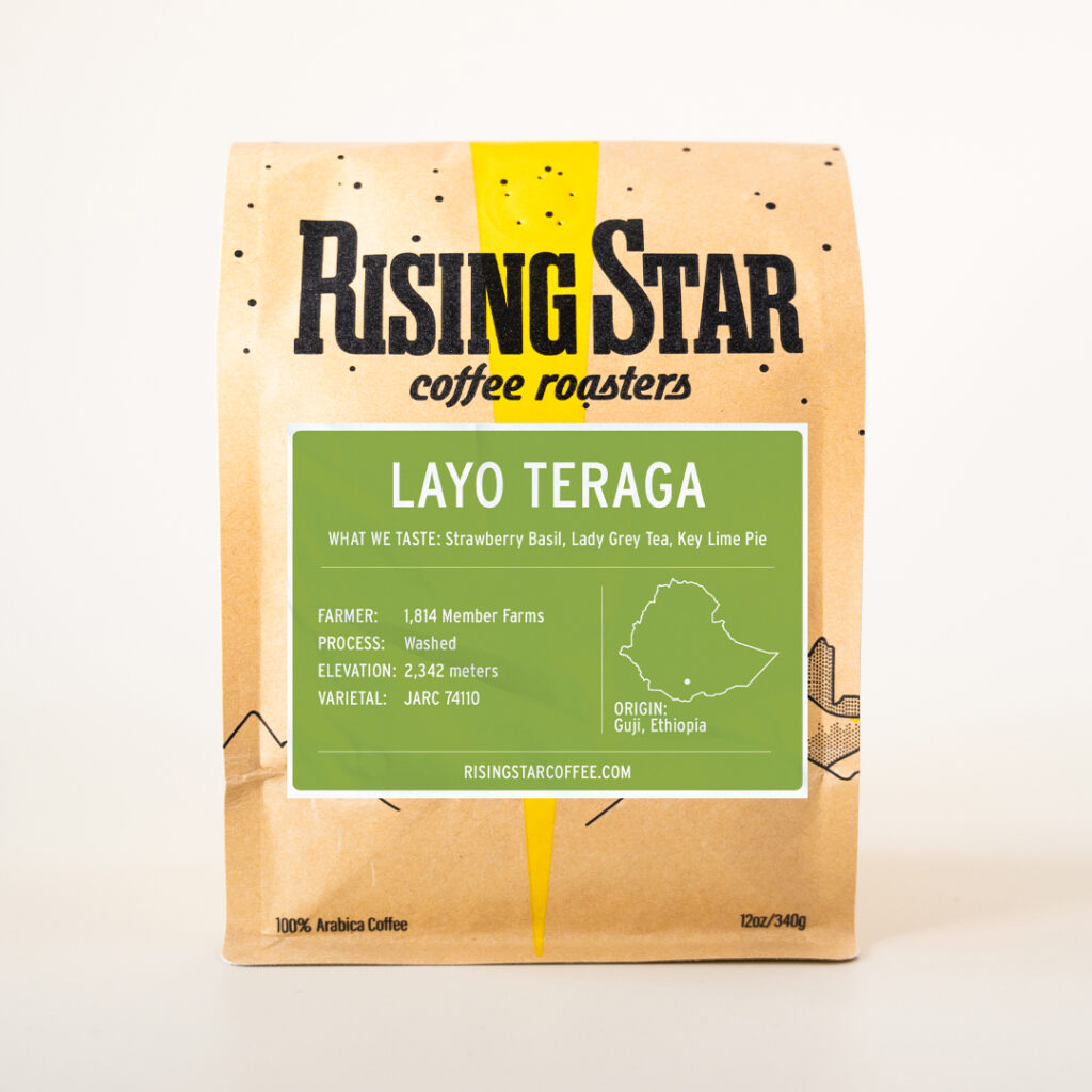 A bag of Rising Star Coffee beans with a light green label called 'Layo Teraga' - from Guji, Ethiopia.